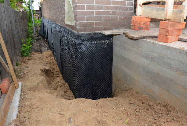SJ Waterproofing Pros technician performing targeted Basement Waterproofing assessment in Watchung, NJ